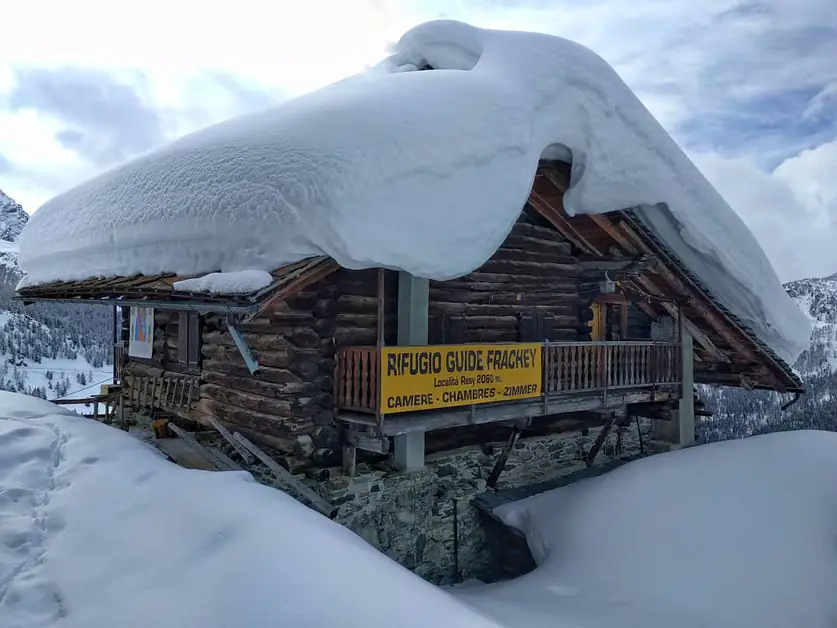 Snowshoeing at Rifugio Guide Frachey for nature lovers
